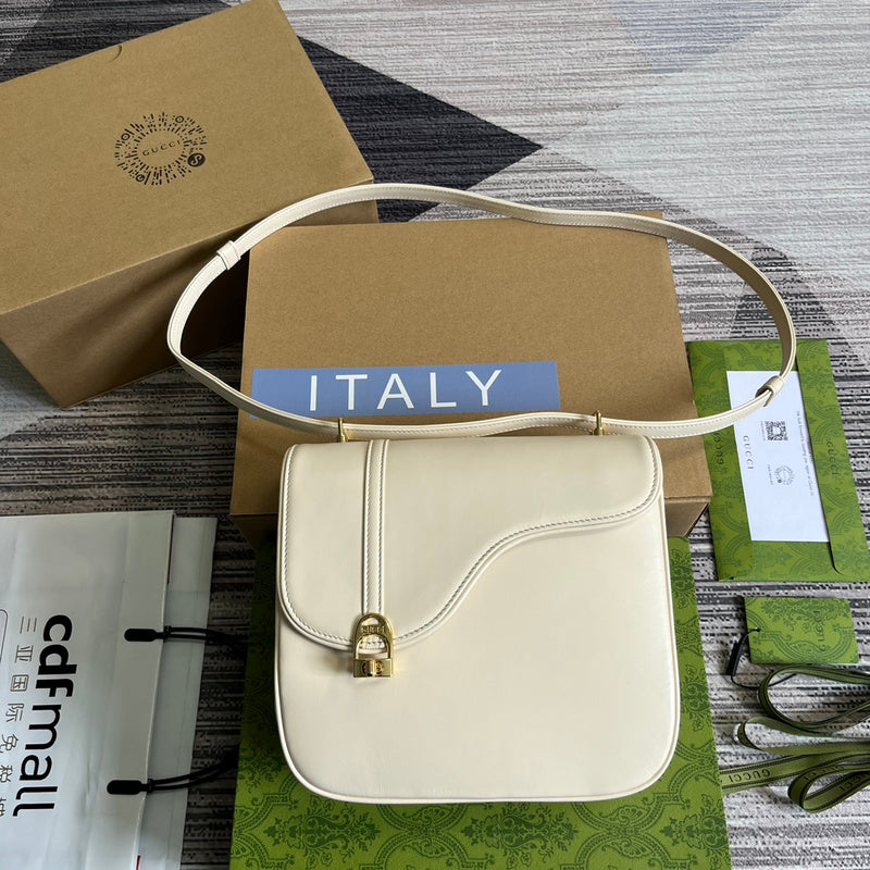 Side profile of classic elevated women's handbag – women's luxury handbag