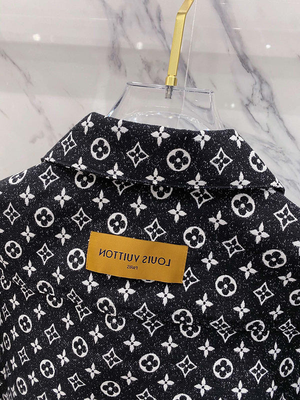 Back view of Louis Vuitton luxury clothing with label-forward styling