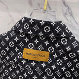 Back view of Louis Vuitton luxury clothing with label-forward styling