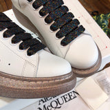 Alexander McQueen Nude High-Top Sneakers - Detail Shot of Craftsmanship