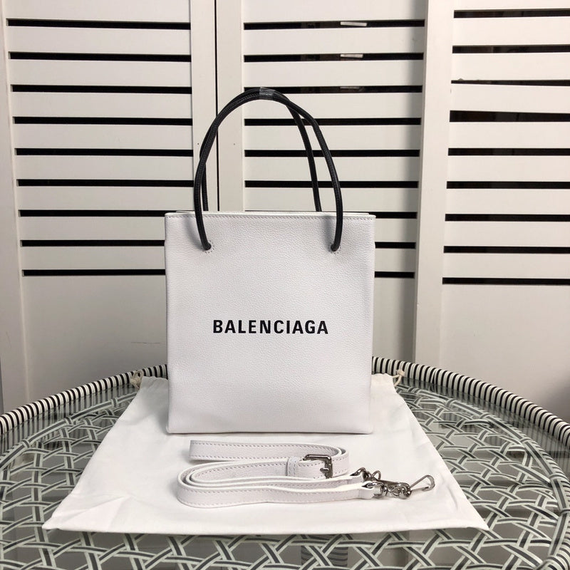 Side profile of structured statement women's handbag – women's luxury handbag
