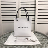 Side profile of structured statement women's handbag – women's luxury handbag