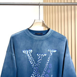 Close-up detail shot of Louis Vuitton luxury clothing with everyday silhouette