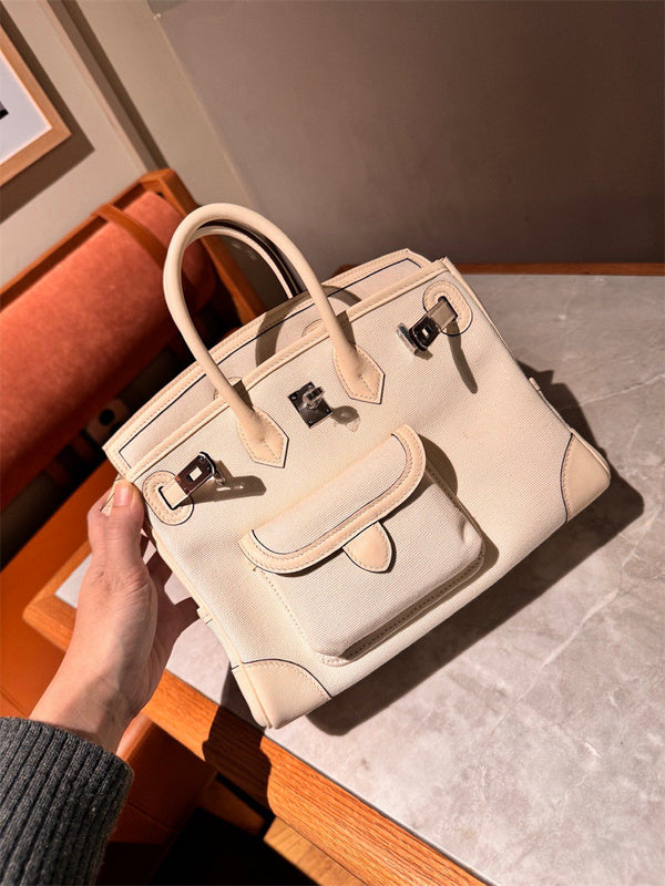 Side view of sculpted structured handbag