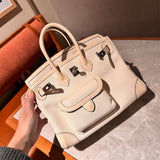 Side view of sculpted structured handbag