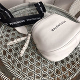 Styled lifestyle shot of statement chic women's handbag – women's luxury handbag