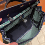 Side view of statement structured handbag