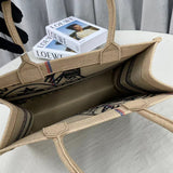 Side profile of chic sleek women's handbag – women's statement bag