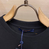 Full styled look of Louis Vuitton cotton t-shirt with signature branding