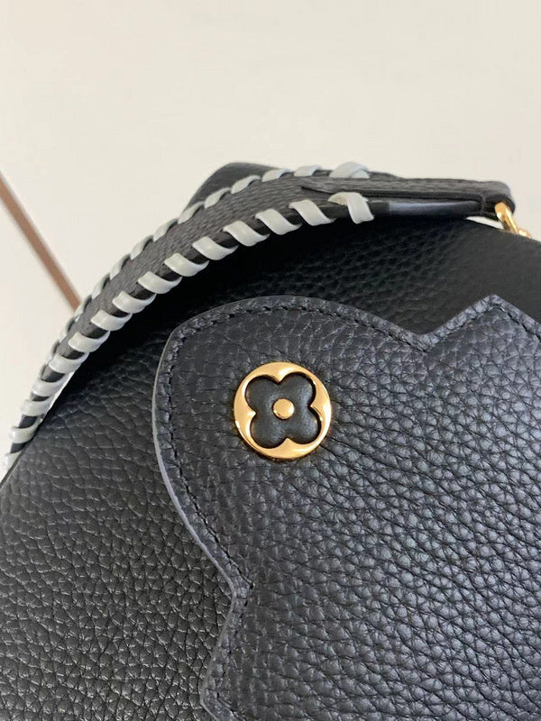 Top view of polished structured women's handbag – women's luxury accessory
