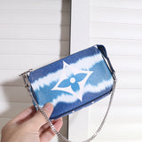Front view of chic polished women's handbag – women's luxury accessory