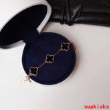 Side view of Van Cleef & Arpels unisex jewelry piece