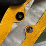 Close-up detail of sleek everyday-luxe women's handbag – women's statement bag