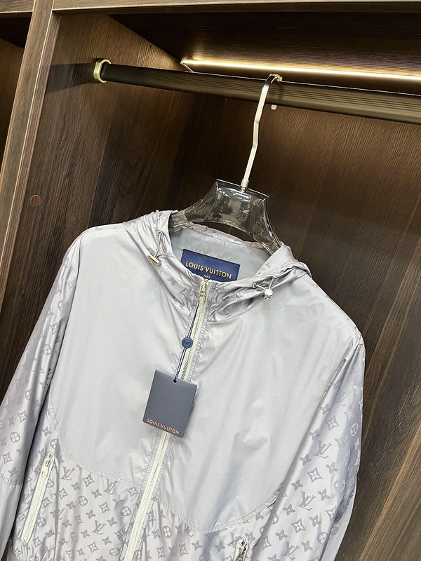 Full styled look of Louis Vuitton luxury clothing with label-forward styling