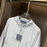 Full styled look of Louis Vuitton luxury clothing with label-forward styling
