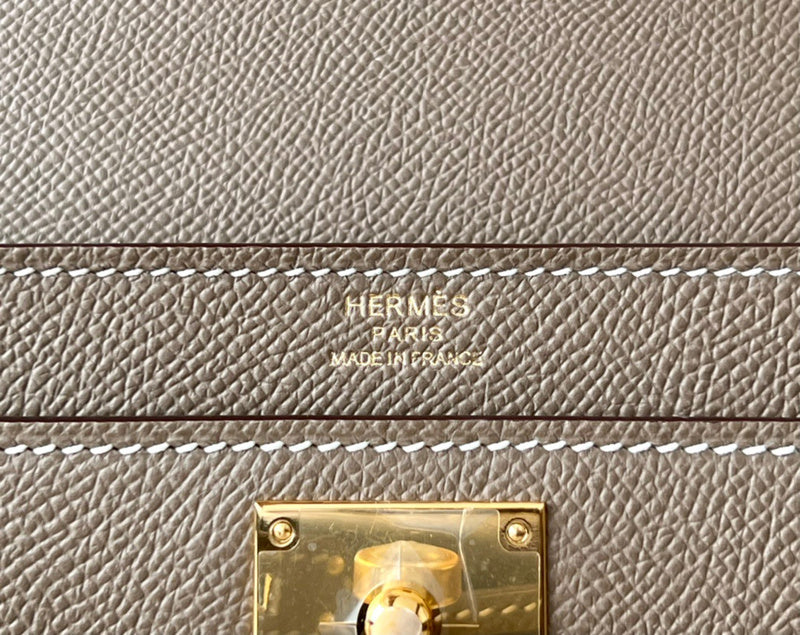 Side view of poised structured handbag