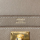 Side view of poised structured handbag