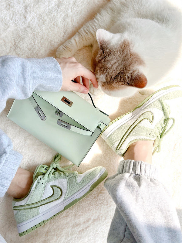Side view of timeless structured handbag