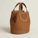 Side view of timeless structured handbag