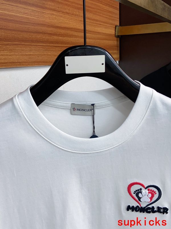 Close-up detail shot of Moncler luxury clothing with contemporary cut