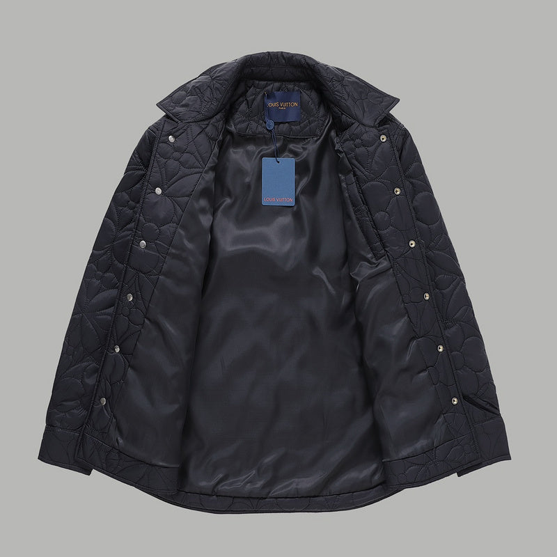 Close-up detail shot of Louis Vuitton luxury clothing with monogram-inspired silhouette