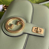 Handle and strap detail of statement everyday-luxe women's handbag – women's statement bag