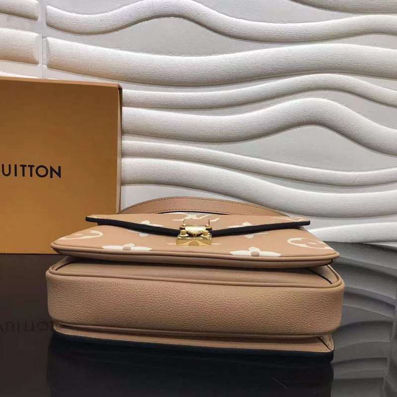 Styled lifestyle shot of structured polished women's handbag – women's luxury accessory