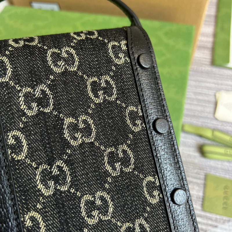 Styled lifestyle shot of structured classic women's handbag – women's statement bag