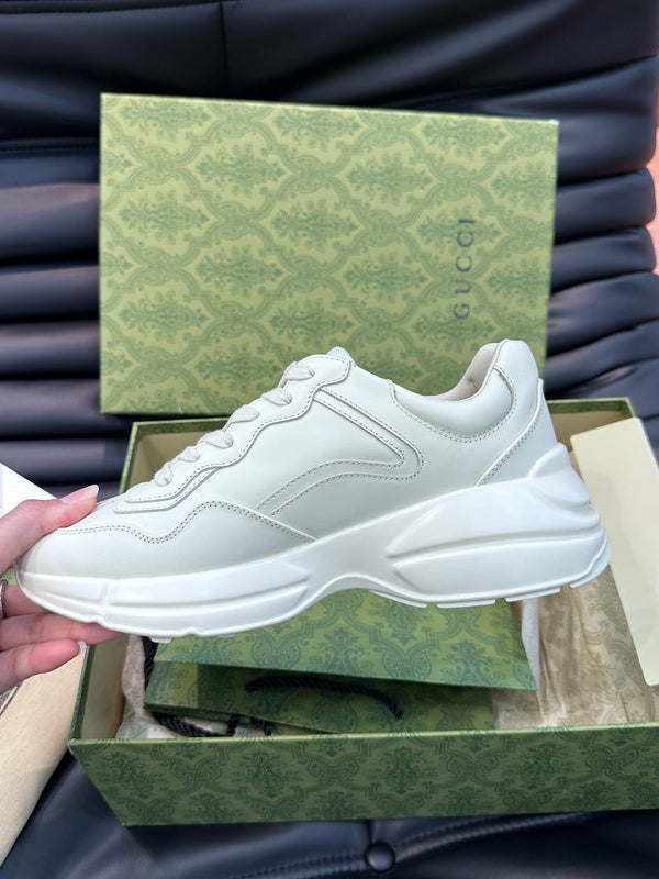 Side profile of Gucci classic monochrome sneakers everyday casual design