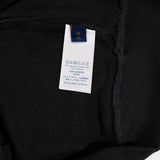 Close-up detail shot of Louis Vuitton luxury clothing with everyday silhouette