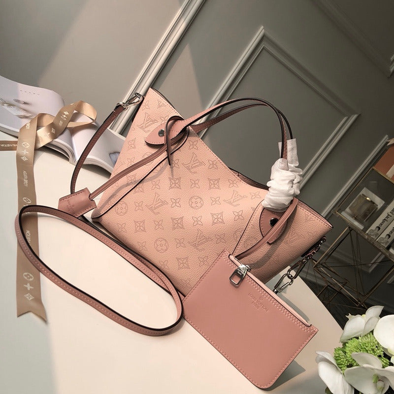 Front view of elevated signature women's handbag – women's statement bag