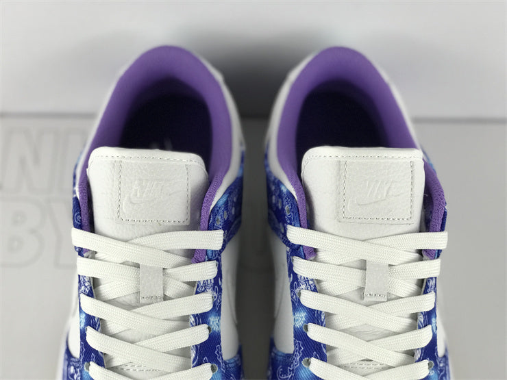 Side profile of Nike classic monochrome sneakers retro runner design