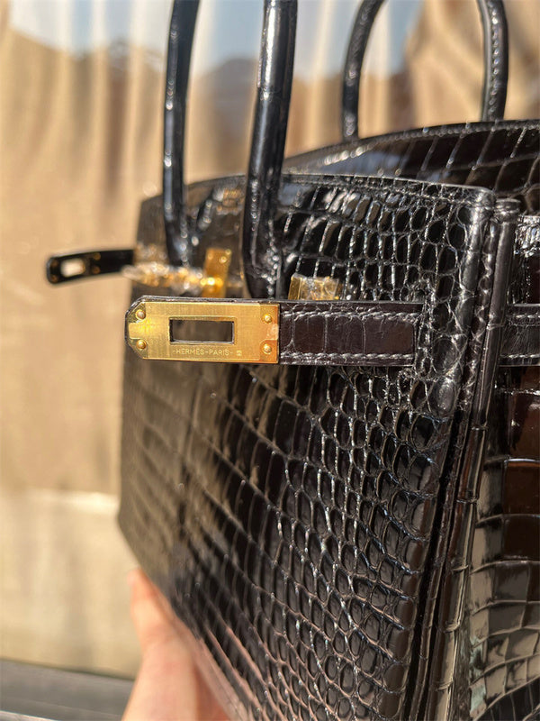 Side view of tailored structured handbag