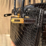 Side view of tailored structured handbag