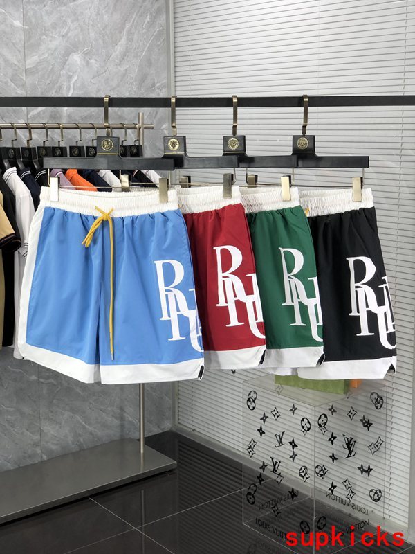Side profile of Rhude luxury clothing with label-forward styling