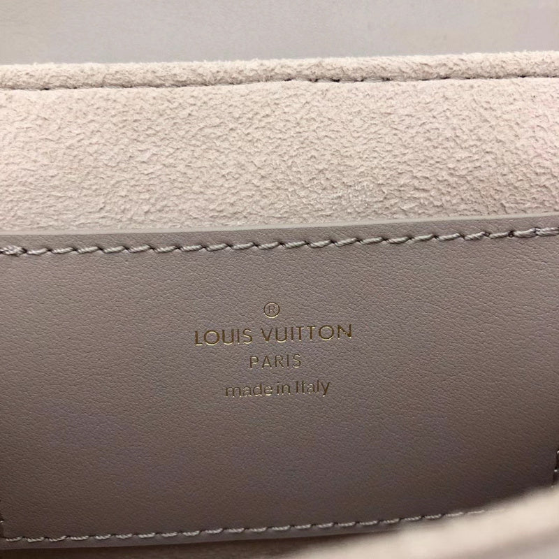 Side profile of signature polished women's handbag – women's premium purse