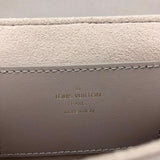 Side profile of signature polished women's handbag – women's premium purse