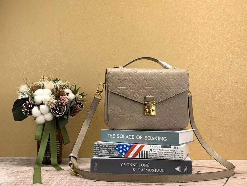 Side profile of classic signature women's handbag – women's luxury accessory