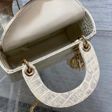 Side profile of statement sleek women's handbag – women's luxury handbag