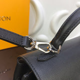 Top view of polished signature women's handbag – women's designer-style accessory