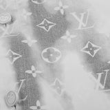 Close-up detail shot of Louis Vuitton luxury clothing with logo-detail design