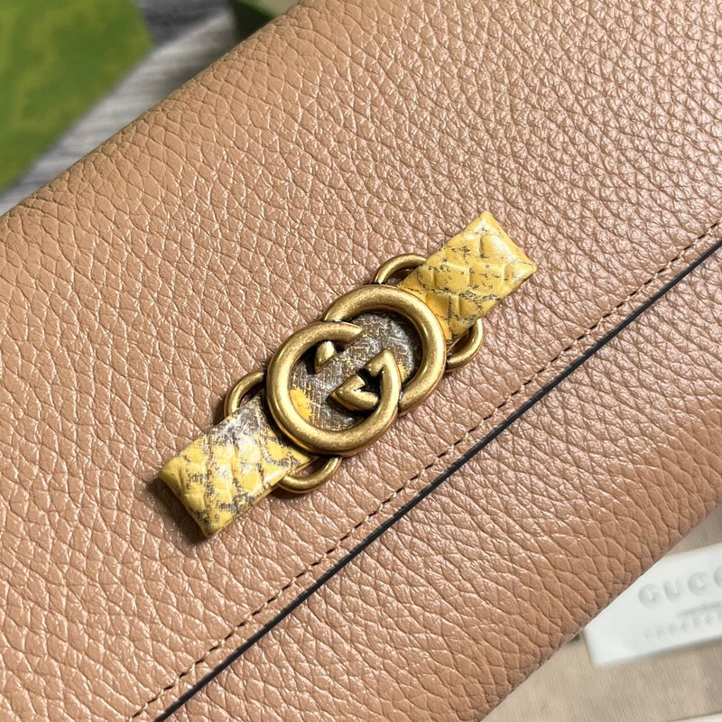 Styled lifestyle shot of polished signature women's handbag – women's designer-style accessory