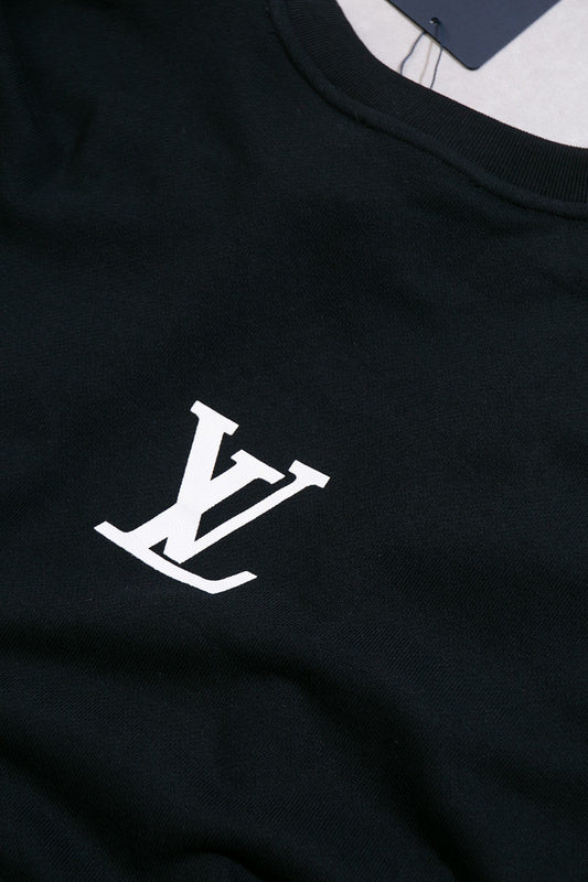 Side profile of Louis Vuitton luxury clothing with label-forward styling