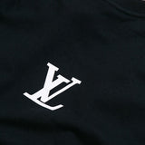 Side profile of Louis Vuitton luxury clothing with label-forward styling