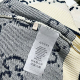 Side profile of Gucci luxury clothing with relaxed-fit cut