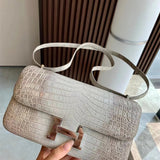 Close-up detail of statement bag design