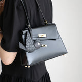Close-up detail of sculpted bag design