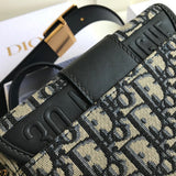 Side profile of polished signature women's handbag – women's designer-style accessory