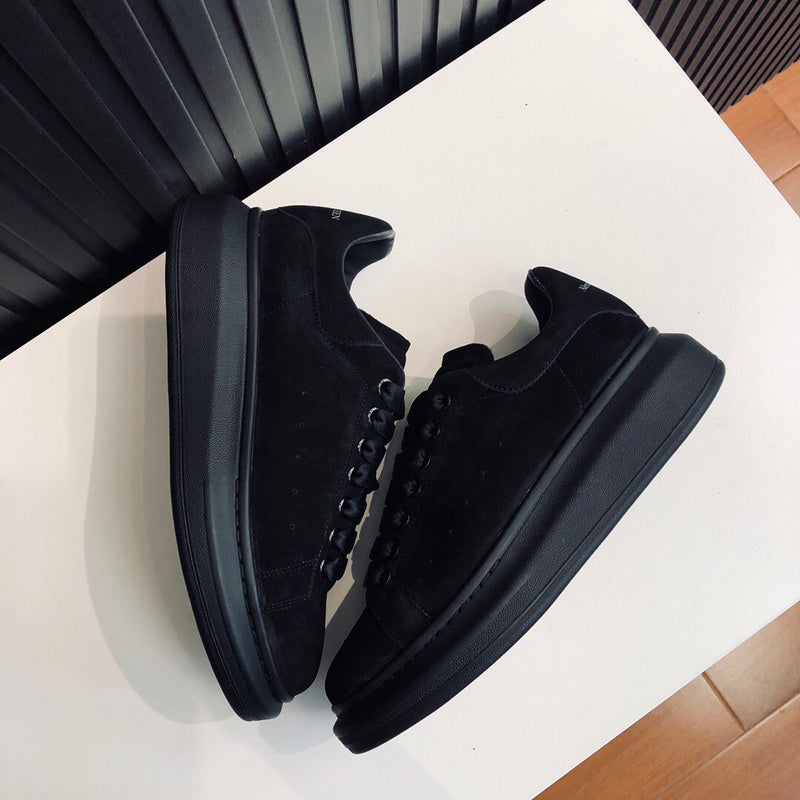 Alexander McQueen tonal black luxury sneakers view 9 classic court silhouette