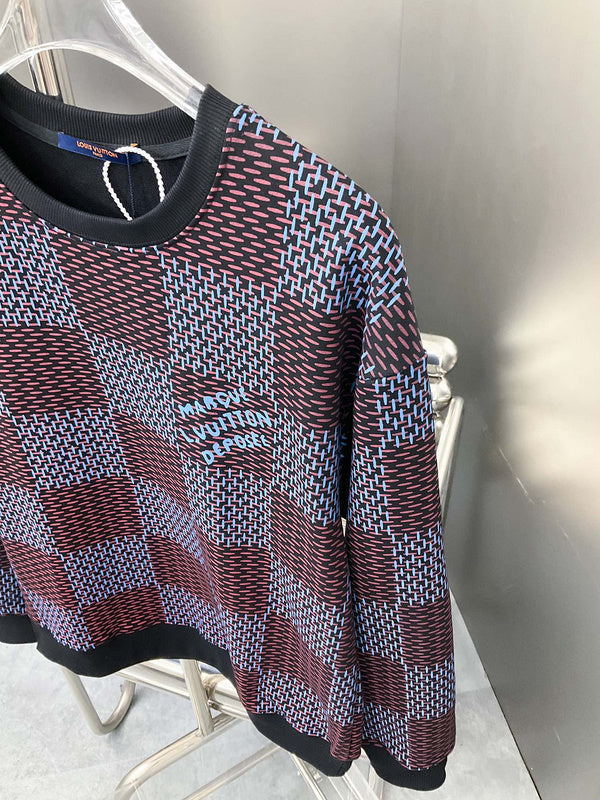 Full styled look of Louis Vuitton luxury clothing with label-forward styling